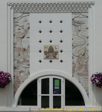 cinema central panel enlarged to show relief sculture - duck hunting and fishing