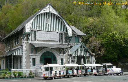 Petit train 
		touristique, this one is outside Lourdes funicular railway station