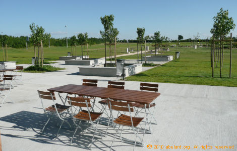 Part of the exterior dining area and view across the aire