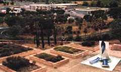 the Catalan Village : the plaza with shops on a dull day