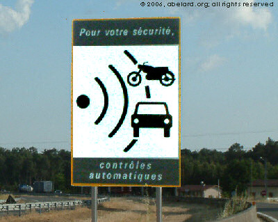 French road sign warning of a speed camera ahead, now being withdrawn