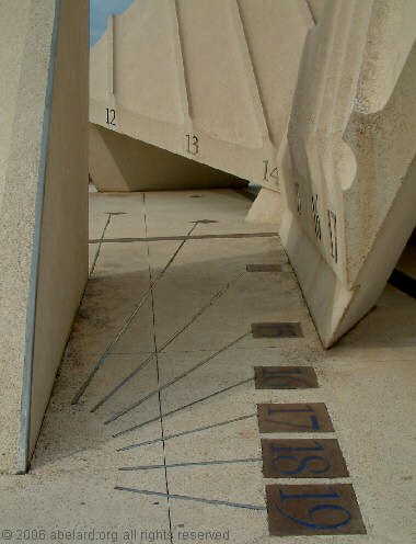 The afternoon horizontal sundial [afternoon gnomon on the left], part of the Nef Solaire, Tavel