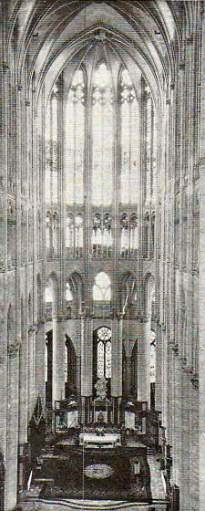 Notice the unusual four levels of windows in this towering cathedral in a closer view of the apse
