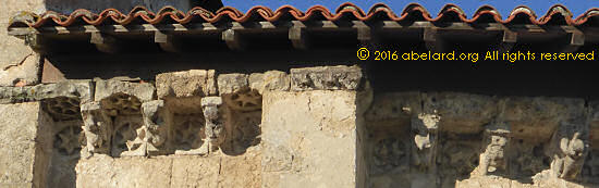 a row of modillons at Beylongue church, Les Landes