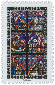Postage stamp with stained glass from Coutances cathedral.