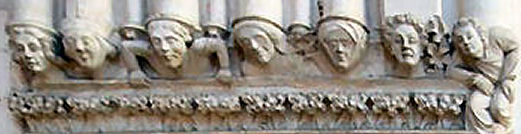 Carved heads at the columns' bases, Sees cathdral