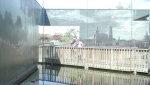 Reflections in a garden display at Futuroscope