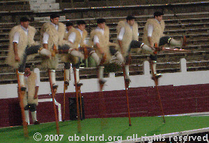 Stilt-dancing display, at a folk festival