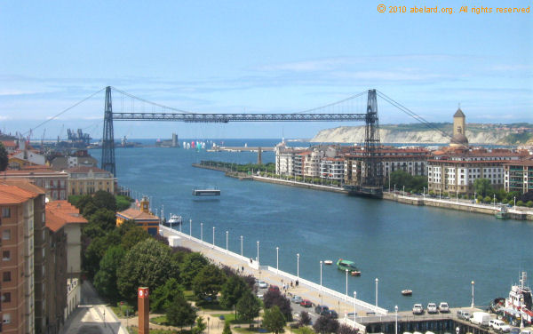 the Viscaya bridge, with the gondola in mid-trajectory