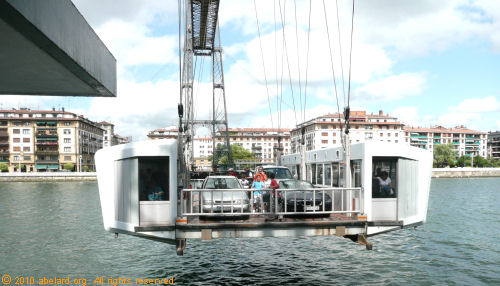 the gondola carries cars, cyclists and foot passengers